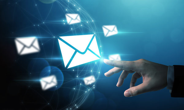 Person pointing to envelope icon